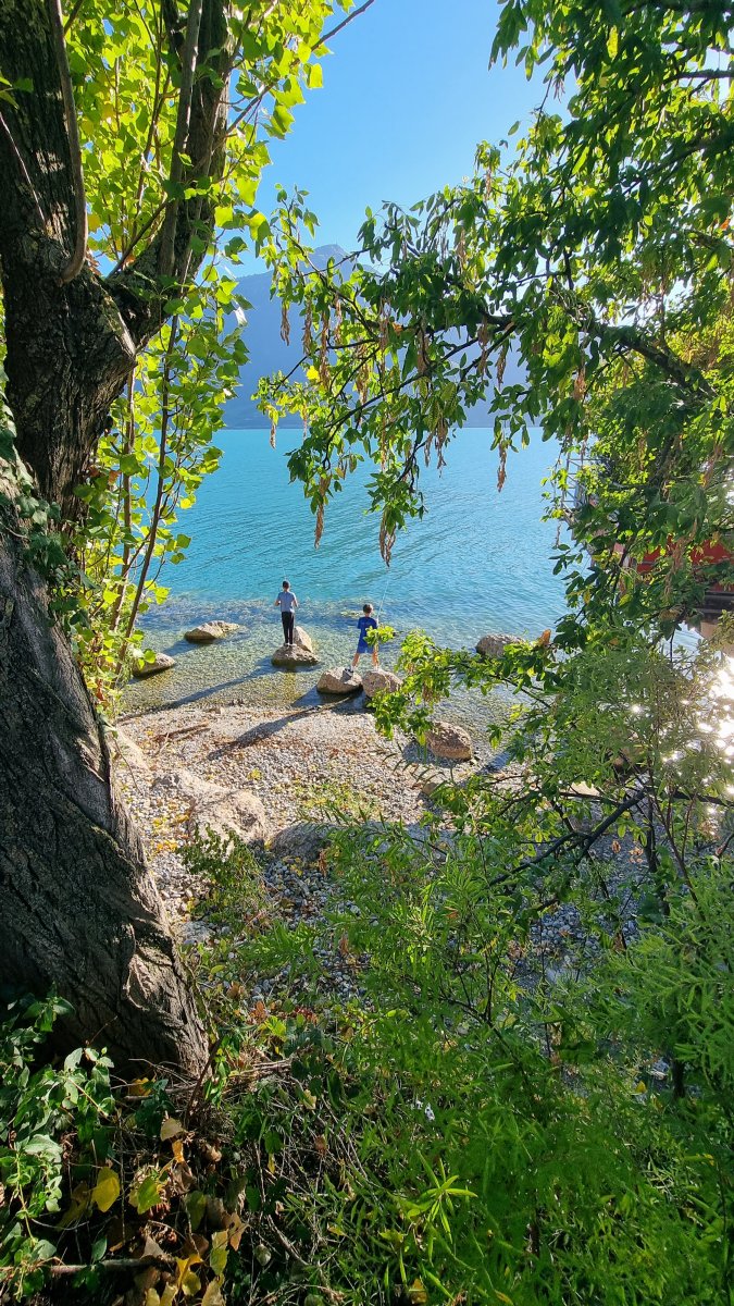 Two young anglers fishing on Lake Zug