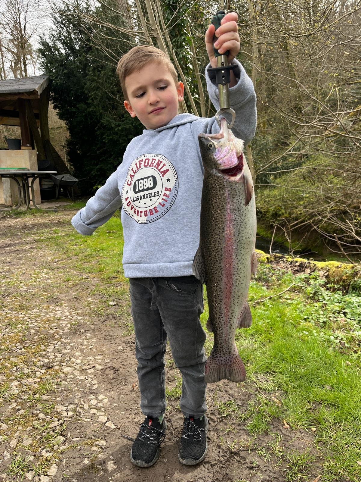 Giant rainbow trout caught during a fishing trip