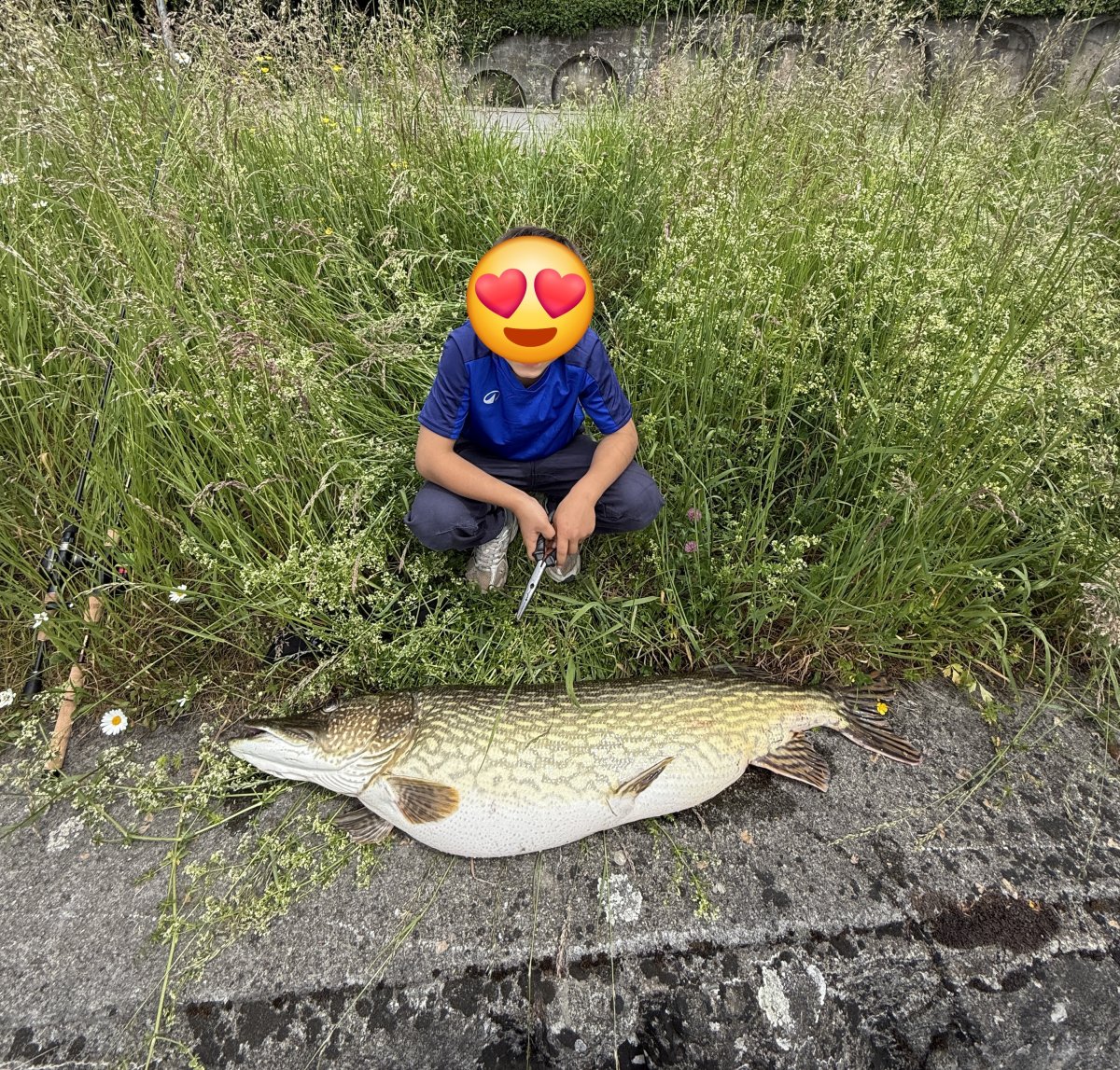 Armando with his massive 1.1m pike caught near the new Badi in Zug
